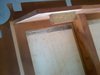 Damage from screws pulled out of the wood