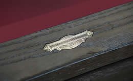 Antique Oak Finish rail with C. L. Bailey name plate